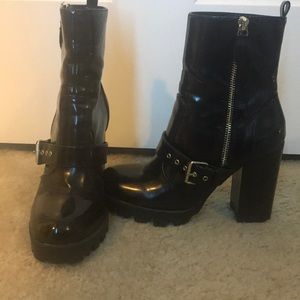Shiny black block heel boots